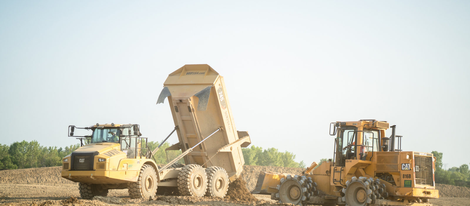 Veit Dump Truck Unloading Dirt at the Ryan Meadows Project