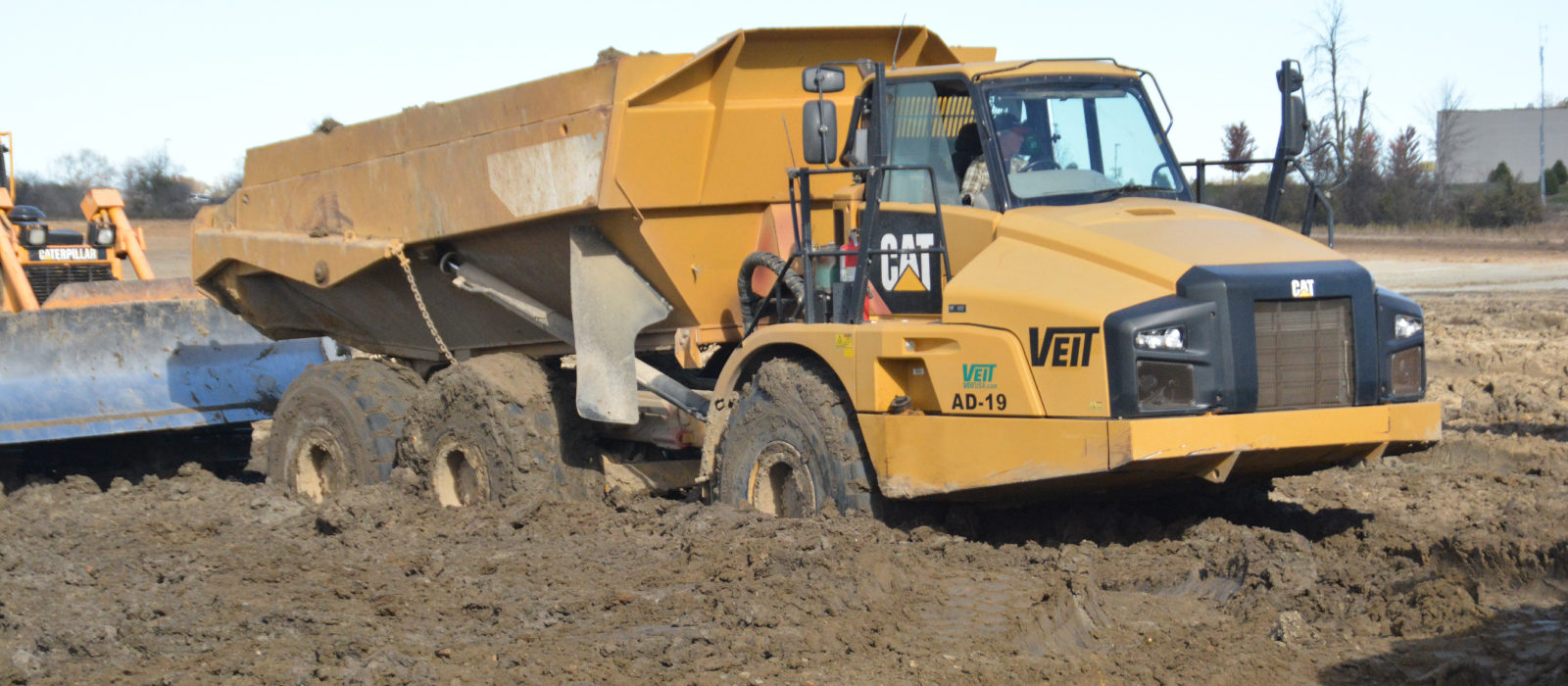 Veit's CAT Dumptruck And Bulldozer On The Dirt