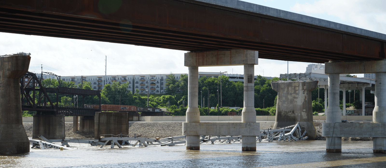 Buck O'Neil bridge arch in river following blast
