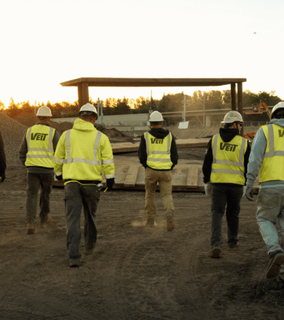 Jobsite crew walking in the early morning